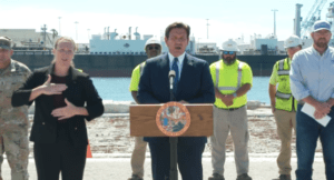 Florida Governor Ron DeSantis speaks at SeaPort Manatee in front of the Kirby 185-01 and US-flagged Tina Pyne, a 185,000 barrel capacity ATB.