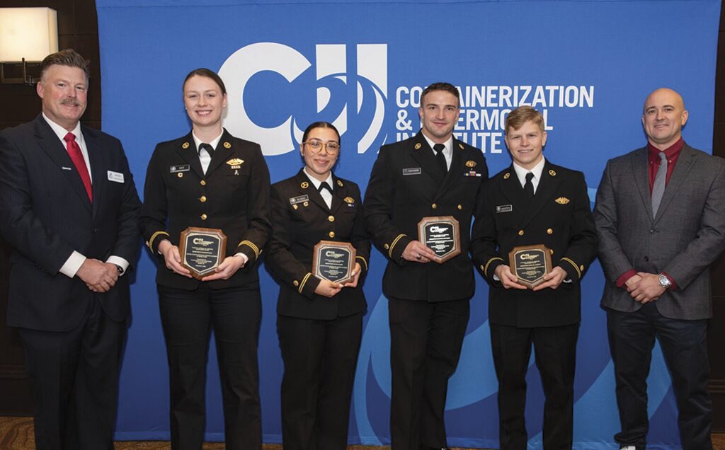 Four students from the U.S. Merchant Marine Academy were awarded the Thomas B. Crowley Sr. Memorial Scholarships last year. From left: John Berry, Crowley Wind Services; USMMA cadets Elizabeth Kay, Gianna Russo, Draygan Colonese and Charles Lausten; Joe St. Pierre, Crowley Wind Services.